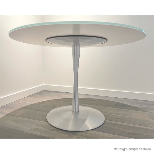 round glass table by Thomas Jacobsen