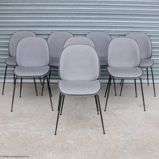 8 upholstered grey Beetle chairs from Gubi